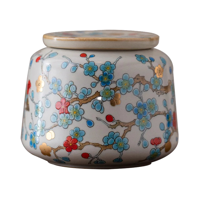 Boîte à thé japonaise en céramique avec motifs floraux dorés – Route du Thé