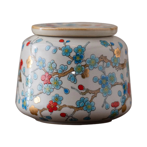 Boîte à thé japonaise en céramique avec motifs floraux dorés – Route du Thé