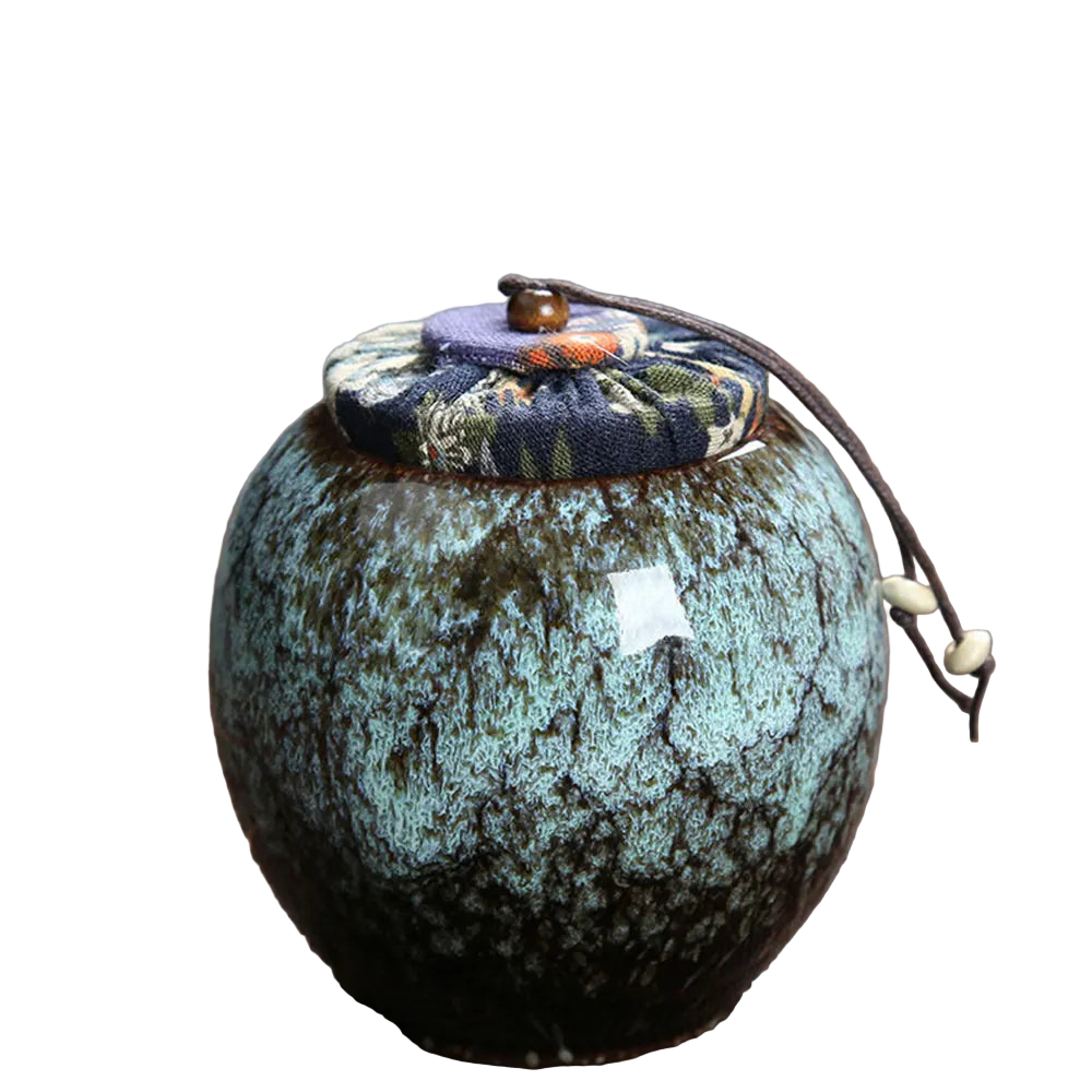 Contenant à thé en céramique vert, style artisanal – Route du Thé