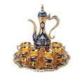 Service à thé oriental bleu et doré avec théière sculptée, 6 tasses et plateau décoratif.