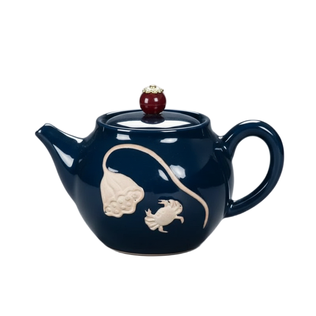 Théière chinoise en porcelaine émaillée sculptée bleu nuit, 270 ml, avec motifs en relief et couvercle décoratif.