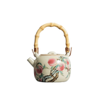 Théière chinoise en porcelaine avec motifs de pêches et poignée en bambou, 210 ml.