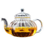 Théière en verre style anglais, 600 ml, parois striées et infusion visible.