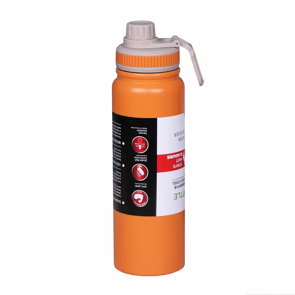 Bouteille isotherme en inox couleur orange avec grip anti-dérapant.